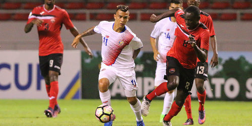 Photo: Trinidad and Tobago National Under-20 Team midfielder Kierron Mason (right) challenges Costa Rica midfielder Randall Leal (centre) during 2017 World Cup qualifying action against Costa Rica at the Estadio Nacional on 22 February 2017. Costa Rica won 1-0. (Copyright Straffon Images)