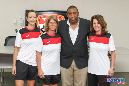 Photo: Trinidad and Tobago Football Association (TTFA) president David John-Williams (second from right) poses with Women's National Senior Team coaches (from left) Nicola Williams, Carolina Morace and Elisabetta Bavagnoli at a press conference on 1 February 2017. (Courtesy Sean Morrison/Wired868)