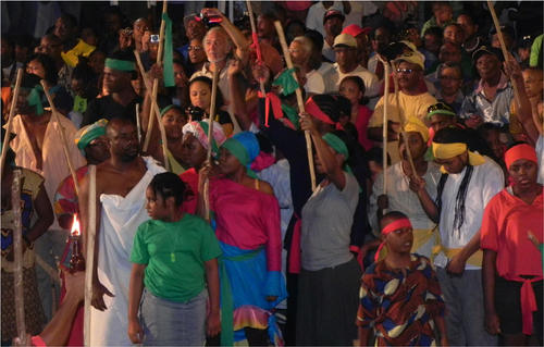 Photo: The NCC hosts a re-enactment of the Canboulay riot. (Copyright Ministry of Community Development)