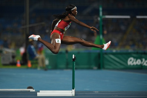 Photo: Trinidad and Tobago’s Janeil Bellille competes in the Women’s 400m Hurdles Semifinal during the Rio 2016 Olympic Games at the Olympic Stadium in Rio de Janeiro on 16 August 2016. (Copyright AFP 2017/Johannes Eisele)