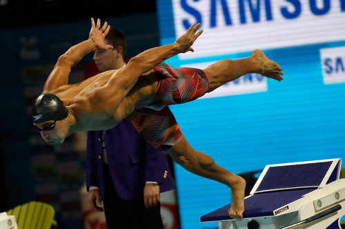 Photo: Trinidad and Tobago’s Dylan Carter competes in the 200m Freestyle final at the 13th FINA World Swimming Championships at the WFCU Centre on 7 December 2016 in Windsor Ontario, Canada. (Copyright AFP 2017/Gregory Shamus/Getty Images)