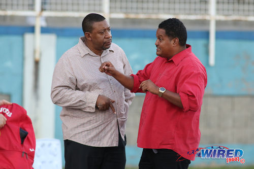 Photo: Sport Minister Darryl Smith (right) makes a point to Trinidad and Tobago Football Association (TTFA) president David John-Williams after women's international friendly action against Venezuela at the Ato Boldon Stadium in Couva on 26 March 2017. (Courtesy Chevaughn Christopher/Wired868)