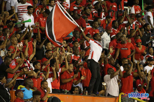 Photo: Trinidad and Tobago football fans enjoy the show during 2018 World Cup qualifying action at the Hasely Crawford Stadium on 24 March 2017. (Courtesy Chevaughn Christopher/Wired868)