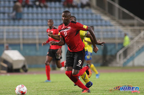 Photo: Trinidad and Tobago National Senior Team forward Jameel Perry chases the ball during international friendly action against Barbados at the Ato Boldon Stadium in Couva on 10 March 2017.  T&T won 2-0 on two goals from substitute forward Jamille Boatswain.  (Courtesy Chevaughn Christopher/Wired868)