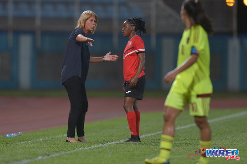 Photo: Trinidad and Tobago Women's National Senior Team head coach Carolina Morace (left) makes a point to attacker Shenelle Henry during international friendly action against Venezuela at the Ato Boldon Stadium in Couva on 29 March 2017. (Courtesy Chevaughn Christopher/Wired868)