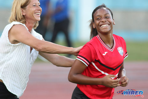 Photo: Trinidad and Tobago Women's National Senior Team coach Carolina Morace (left) shares a light moment with forward Laurelle Theodore after their international friendly encounter with Venezuela at the Ato Boldon Stadium in Couva on 26 May 2017. Theodore missed a late opportunity as the two nations played to a goalless draw. (Courtesy Chevaughn Christopher/Wired868)