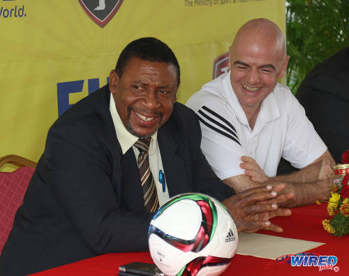 Photo: FIFA president Gianni Infantino (right) and TTFA president David John-Williams at a press conference at the Ato Boldon Stadium in Couva on 10 April 2017. (Courtesy Sean Morrison/Wired868)