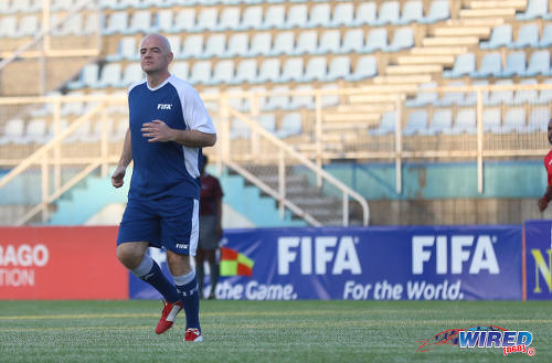 Photo: FIFA president Gianni Infantino struts at the Ato Boldon Stadium in Couva during an exhibition match on 10 April 2017. (Courtesy Sean Morrison/Wired868)