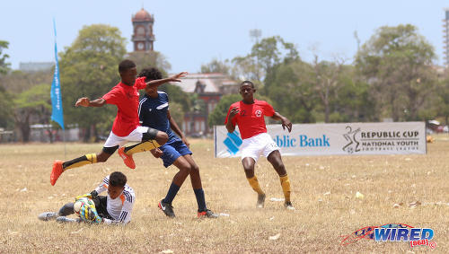 Photo: The Belmont Secondary goalkeeper pulls off a rare save during RBNYL North Zone Under-15 action against Trendsetter Hawks at the Queen's Park Savannah on 22 April 2017. The Hawks romped to a 11-0 win. (Courtesy Sean Morrison/Wired868)