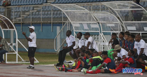 Photo: Trinidad and Tobago National Under-15 Team coach Russell Latapy (left) likes what he sees during an exhibition match at the Ato Boldon Stadium on 15 April 2017. (Courtesy Sean Morrison/Wired868)