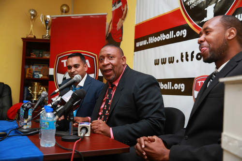 Photo: TTFA president David John-Williams (centre), media officer Shaun Fuentes (left) and new Soca Warriors coach Dennis Lawrence at the TTFA headquarters on 30 January 2017. (Copyright Allan V Crane/TTFA)