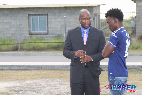 Photo: TTFA general secretary Justin Latapy-George (left) chats with TTSL general secretary Camara David at the Ato Boldon Stadium, Couva on 10 April 2017. (Courtesy Sean Morrison/Wired868)