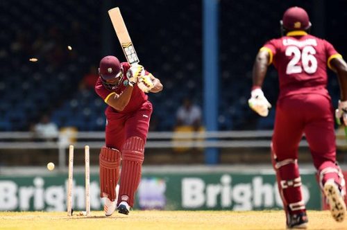 Photo: Trinidad and West Indies batsman Kieron Pollard is bowled off Pakistan's Rumman Raees during the final of four T20I matches at the Queen’s Park Oval in Port of Spain on 2 April 2017. (Copyright AFP 2017/Jewel Samad)