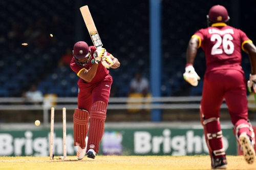 Photo: West Indies' Kieron Pollard is bowled off Pakistan's Rumman Raees during the final of four T20I matches at the Queen’s Park Oval in Port of Spain on 2 April 2017. (Copyright AFP 2017/Jewel Samad)