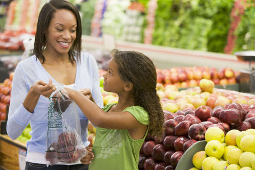 Photo: A family shops at a supermarket. (Copyright Swansons Foods)