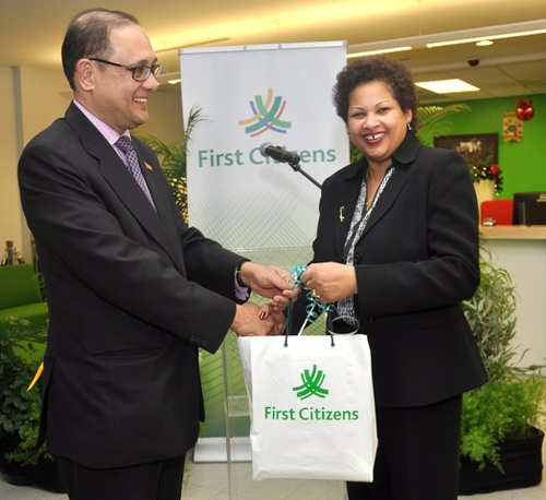 Photo: Then First Citizens Bank chairperson Nyree Alfonso (right) and Minister of Finance and ex-First Citizens CEO Larry Howai. (Copyright Firstcitizenstt)