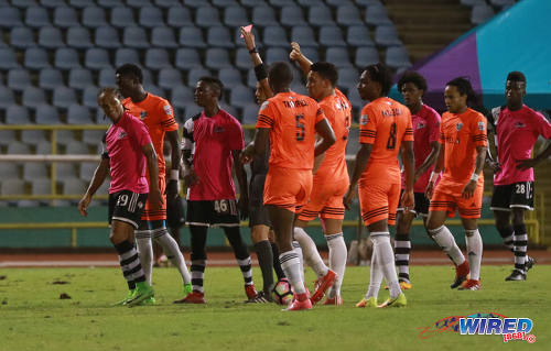 Photo: Referee Ricangel de Leca (centre) shows the red card to Central FC midfielder Nathaniel Garcia (far left) during 2017 Caribbean Club Championship action at the Hasely Crawford Stadium on 18 May 2017. (Courtesy Sean Morrison/Wired868)