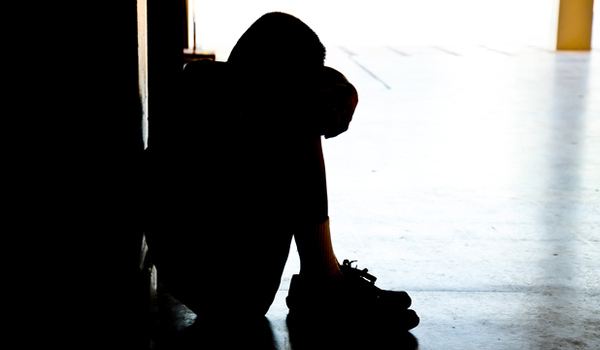 Photo: The silhouette of a neglected child.