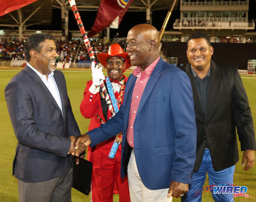 Photo: Prime Minister Keith Rowley (centre) greets SPORTT CEO Dinanath Ramnarine (left) while Sport Minister Darryl Smith (right) looks on during the opening of the Brian Lara Cricket Stadium in Tarouba on 12 May 2017. (Courtesy Sean Morrison/Wired868)