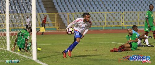 Photo: Portmore United substitute Maalique Foster (centre) races back to the halfline after his team's opening goal against San Juan Jabloteh during 2017 Caribbean Club Championship action at the Hasely Crawford Stadium on 18 May 2017. (Courtesy Sean Morrison/Wired868)