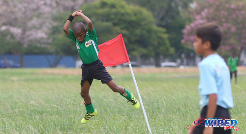 Photo: Harvard SC attacker Josh Miguel (left) mimics Real Madrid and Portugal superstar Cristiano Ronaldo as he celebrates his goal against QPCC during RBNYL North Zone U-11 action at the Queen's Park Savannah in Port of Spain on 27 May 2017. (Courtesy Sean Morrison/Wired868)