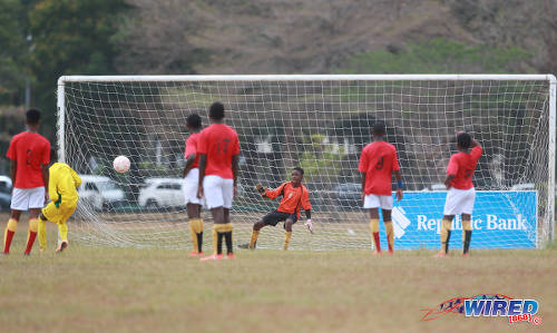 Photo: Laventille United goalkeeper Josiah Coy (second from left) beats Trendsetter Hawks custodian Jaheim Morris from the penalty spot during RBNYL Under-15 action against Eastern United at the Queen's Park Savannah on 15 May 2017. It was the lone highlight for Laventille who lost 11-1. (Courtesy Nicholas Bhajan/Wired868)