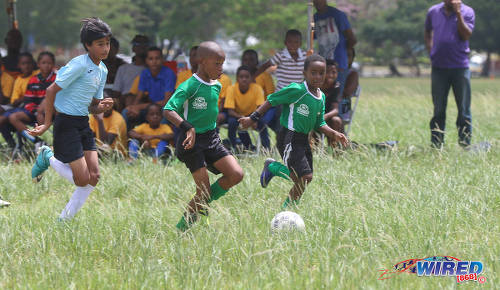 Photo: Harvard SC attacker Josh Miguel tries to find the path to goal against QPCC '2' during RBNYL North Zone U-11 action at the Queen's Park Savannah in Port of Spain on 27 May 2017. (Courtesy Sean Morrison/Wired868)